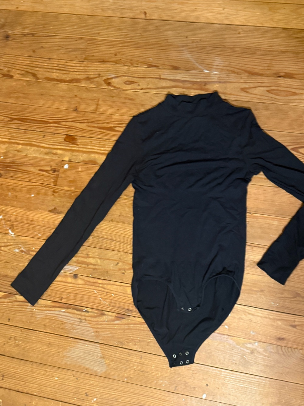 Yummie brand Black Long-Sleeve Women's Jumpsuit with stomach smoothing gusset